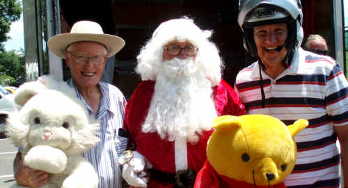 Jim Geiger, Santa and Member for Gympie David Gibson get ready for the annual Ulysses toy run. Jim Geiger, Santa and Member for Gympie David Gibson get ready for the annual Ulysses toy run.